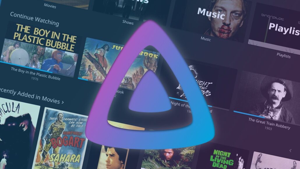 Streaming app interface with poster tiles and a large purple‑blue triangular logo centered on the screen
