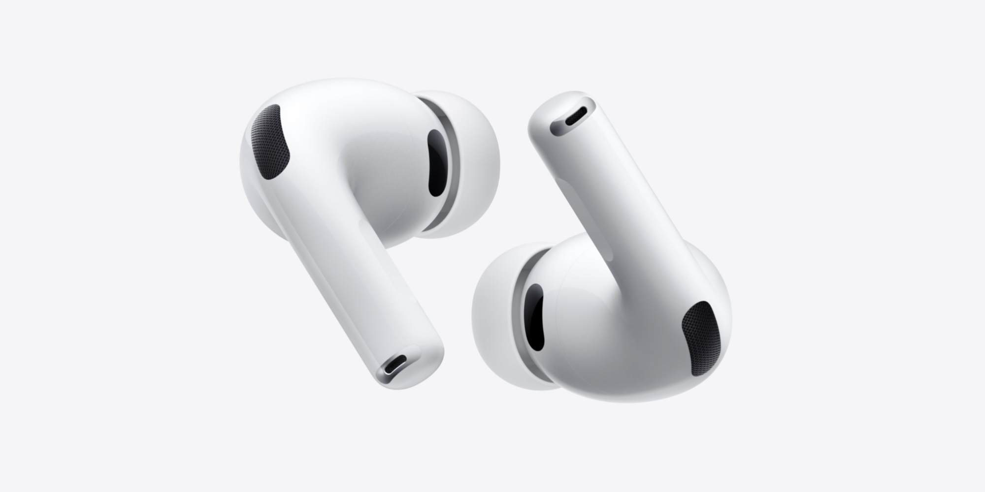 Apple just released new AirPods Pro 3 firmware more - Dans Tutorials - Dans Tutorials Pair of white wireless earbuds floating against a light gray background, showing their stems and mesh ear tips.