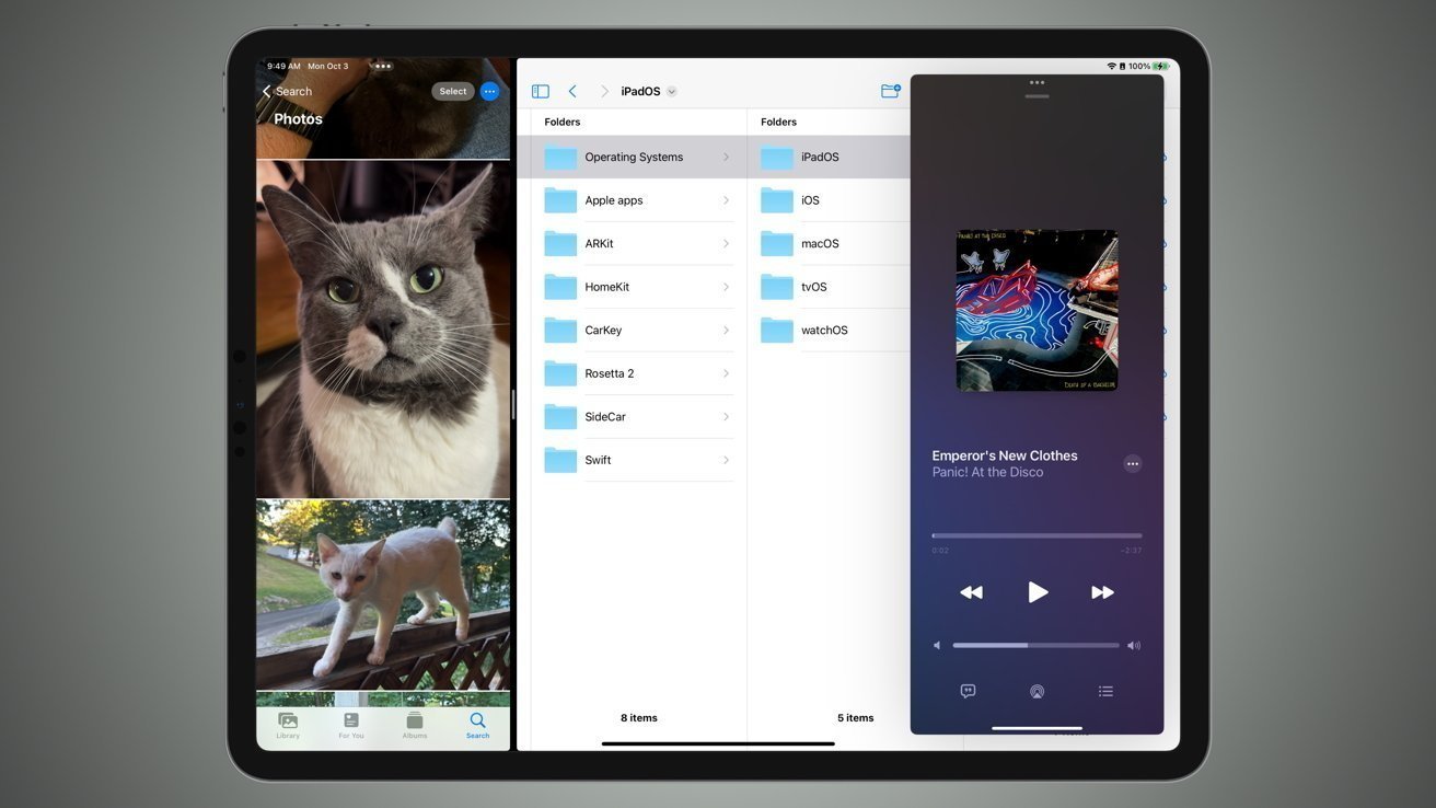 iPad split-screen: Photos app with cat photos on the left, Files app folders in the center, and a music player on the right.