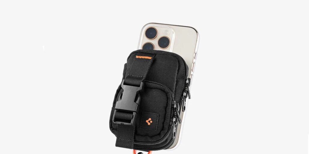 Black tactical phone holster strapped to the back of a smartphone with orange stitching detail.