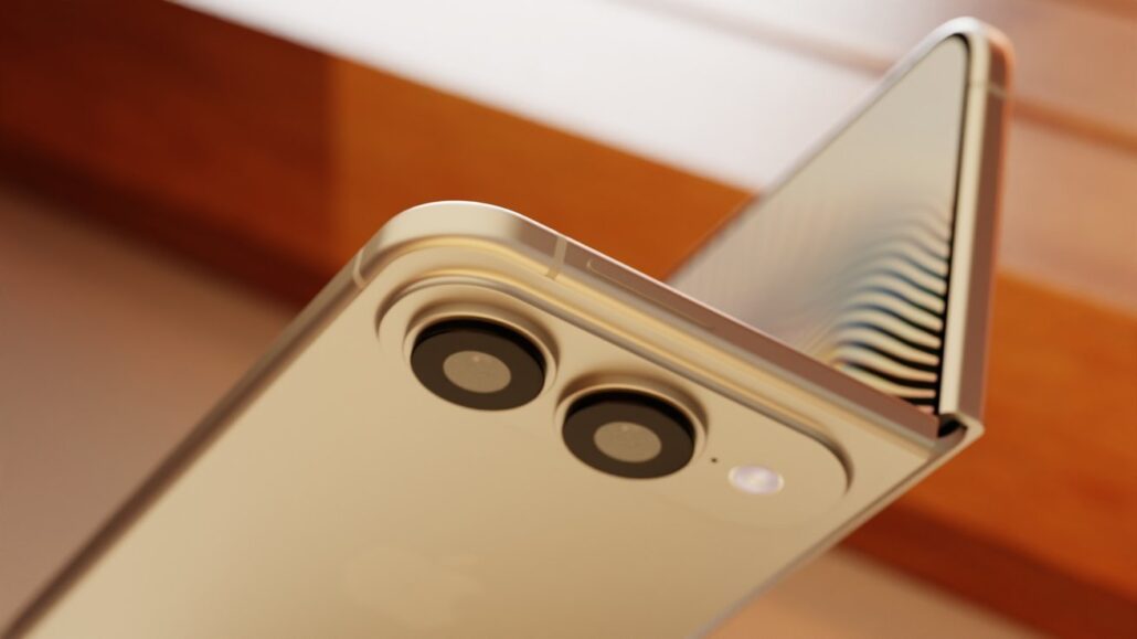 Close-up of a gold foldable smartphone showing dual rear cameras and a partially unfolded screen, with a visible hinge.