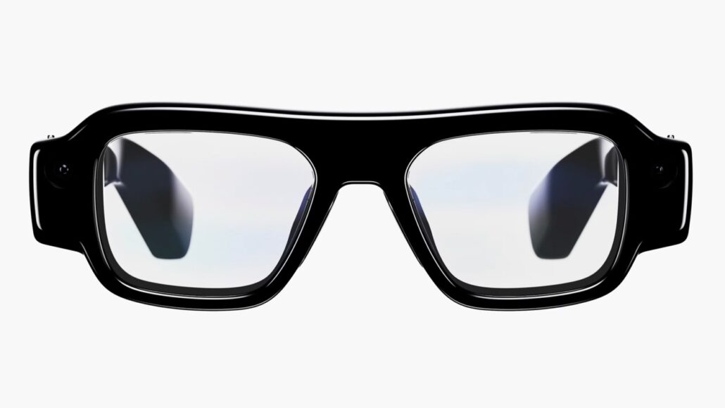 Black frame VR/AR goggles with reflective lenses, facing forward on a white background
